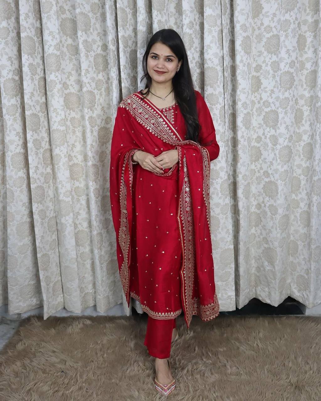 Raveena Tandon in a red anarkali suit at Karwa Chauth celebrations